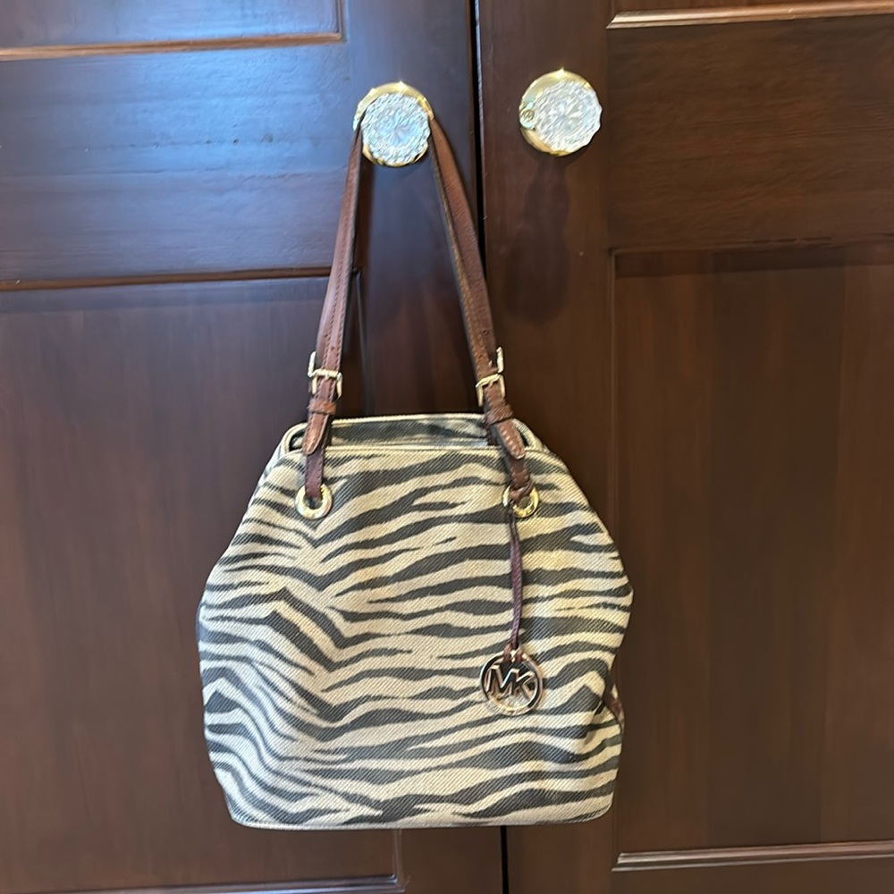 Michael Kors tan/brown zebra print canvas purse